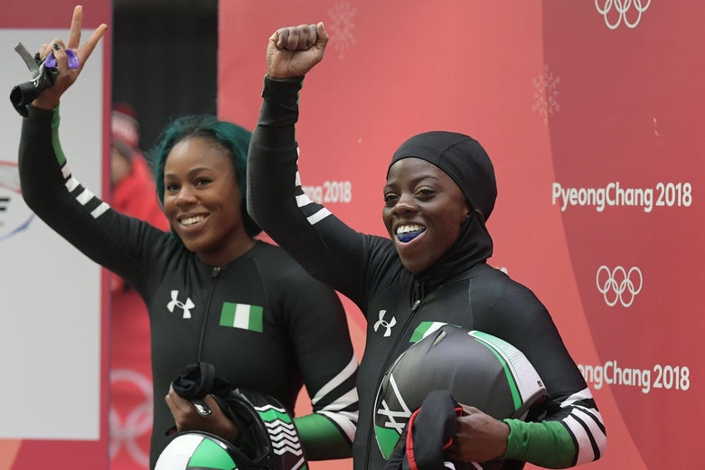 Nigeria's Moriam Seun Adigun (R) and Nigeria's Akuoma Omeoga wave after the women's bobsleigh heat 2 run during the Pyeongchang 2018 Winter Olympic Games, at the Olympic Sliding Centre on February 20, 2018 in Pyeongchang. / AFP PHOTO / MOHD RASFAN (Photo credit should read MOHD RASFAN/AFP/Getty Images)